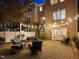 Cozy backyard patio with outdoor furniture and string lights, perfect for evening relaxation at 3920 Bentley Brook Dr, Raleigh, NC 27612