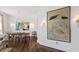 Dining room featuring modern lighting fixtures, hardwood floors, and stylish decor at 3920 Bentley Brook Dr, Raleigh, NC 27612