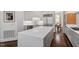Kitchen with large island, stainless appliances, and an adjacent breakfast nook at 3920 Bentley Brook Dr, Raleigh, NC 27612