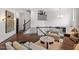 Elegant living room with hardwood floors, stylish furniture, and sophisticated decor at 3920 Bentley Brook Dr, Raleigh, NC 27612