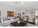 Bright living room with hardwood floors, neutral decor, and modern lighting at 3920 Bentley Brook Dr, Raleigh, NC 27612
