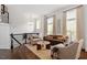 Bright living room with hardwood floors and stylish furnishings, including plush sofas and chairs at 3920 Bentley Brook Dr, Raleigh, NC 27612