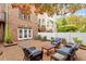 Inviting brick patio with comfortable seating and a charming brick exterior, perfect for outdoor relaxation and entertainment at 3920 Bentley Brook Dr, Raleigh, NC 27612