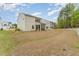 Exterior view showcases a spacious backyard of the home at 4005 Sierra Pelona Dr, Raleigh, NC 27616