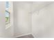 Small closet with a wire shelf, neutral paint and carpeted floor at 4005 Sierra Pelona Dr, Raleigh, NC 27616