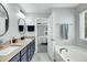 Bathroom with double sink vanity and soaking tub at 416 Glenview Ln, Durham, NC 27703
