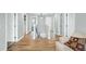 Spacious hallway with hardwood floors and access to multiple rooms at 416 Glenview Ln, Durham, NC 27703