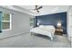 Spacious main bedroom with a tray ceiling and large windows at 416 Glenview Ln, Durham, NC 27703