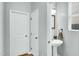 Stylish powder room with pedestal sink and modern fixtures at 416 Glenview Ln, Durham, NC 27703