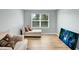 Comfortable sitting room with seating area and ample natural light at 416 Glenview Ln, Durham, NC 27703