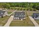 Beautiful two story home with black shutters, above ground pool and a large backyard at 46 Twelve Oaks Dr, Willow Springs, NC 27592