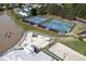 Community park with tennis court, beach volleyball and playground by the lake at 512 N Waters Edge Dr, Durham, NC 27703