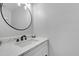 Elegant bathroom featuring a modern vanity with marble countertop and stylish mirror at 512 N Waters Edge Dr, Durham, NC 27703