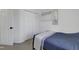 Bedroom with a double door closet and calming decor at 512 N Waters Edge Dr, Durham, NC 27703