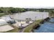 Community park with a playground, beach volleyball, tennis courts, and basketball courts by the lake at 512 N Waters Edge Dr, Durham, NC 27703