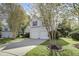 Charming two-story home with a three-car garage, well maintained yard and landscape at 512 N Waters Edge Dr, Durham, NC 27703
