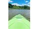 Enjoy kayaking on this lake. Close up view from the front of a green kayak, water and trees at 512 N Waters Edge Dr, Durham, NC 27703