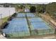 Four tennis courts and two basketball courts close to a lake in the neighborhood at 512 N Waters Edge Dr, Durham, NC 27703