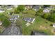 Aerial view of a well-manicured house with a spacious backyard in a quiet neighborhood at 5505 Armada Dr, Raleigh, NC 27610