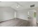 Bright and spacious living room featuring vaulted ceilings and modern flooring at 5505 Armada Dr, Raleigh, NC 27610