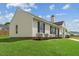 A charming home showcasing neat landscaping and durable vinyl siding at 5505 Armada Dr, Raleigh, NC 27610