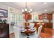 Bright kitchen nook with seating, stainless appliances and direct access to the outdoor deck at 572 W Walker Woods Ln, Clayton, NC 27527