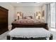 Luxurious main bedroom features a large bed and soft, inviting textures at 572 W Walker Woods Ln, Clayton, NC 27527
