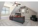 Upstairs office features custom built-ins, a ceiling fan, and neutral walls at 572 W Walker Woods Ln, Clayton, NC 27527