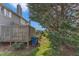 Backyard with a fenced area and trash cans at 5900 Shady Grove Cir, Raleigh, NC 27609