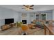 Inviting living room showcases a fireplace, modern furniture, and a sleek entertainment center at 5900 Shady Grove Cir, Raleigh, NC 27609