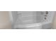 Close-up of a clean, white, fiberglass shower and tub combo unit at 5900 Shady Grove Cir, Raleigh, NC 27609