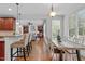 Open concept view from the kitchen into the dining room and living room at 629 Peach Orchard Pl, Cary, NC 27519