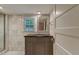 A bathroom featuring marble walls and tiled floors at 704 W Front St, Burlington, NC 27215