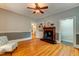 Bright bonus room with hardwood floors, fireplace, and classic trim details at 704 W Front St, Burlington, NC 27215