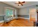 Charming bonus room with hardwood floors, chair railing, and ample natural light at 704 W Front St, Burlington, NC 27215