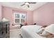 Comfortable bedroom with a bright window seat and inviting interior at 7328 Caversham Way, Raleigh, NC 27617