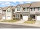 Charming townhome featuring a one car garage and well manicured lawn at 7328 Caversham Way, Raleigh, NC 27617