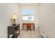 Versatile home office space with natural light, a desk, and storage, ideal for working from home at 7328 Caversham Way, Raleigh, NC 27617