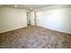 The bedroom has neutral walls and plush carpet at 7702 Nc Highway 581, Kenly, NC 27542