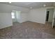 This bedroom has neutral walls and plush carpet at 7702 Nc Highway 581, Kenly, NC 27542