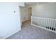 Hallway with new carpet and railings at 7702 Nc Highway 581, Kenly, NC 27542