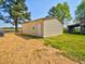 The property includes a storage outbuilding at 7702 Nc Highway 581, Kenly, NC 27542