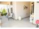 Inviting covered front porch with chairs and seasonal decorations offering a relaxing outdoor space at 828 Traditions Ridge Dr, Wake Forest, NC 27587