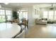 Open-concept living space featuring a dining area and a comfortable living room with lots of natural light at 828 Traditions Ridge Dr, Wake Forest, NC 27587