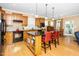 Kitchen featuring an island with bar seating, and stainless steel appliances at 833 Gaston Manor Dr, Durham, NC 27703