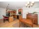 Spacious kitchen with a kitchen island, dining table, and updated appliances at 833 Gaston Manor Dr, Durham, NC 27703