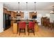 Modern kitchen featuring an island with pendant lighting and stainless steel appliances at 833 Gaston Manor Dr, Durham, NC 27703