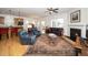 Open floor plan featuring living room and kitchen with abundant seating and fireplace at 833 Gaston Manor Dr, Durham, NC 27703