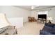 Cozy bonus room featuring comfortable seating, soft carpet, and natural light at 833 Gaston Manor Dr, Durham, NC 27703