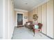 Welcoming front porch with comfortable seating, perfect for relaxing outdoors at 833 Gaston Manor Dr, Durham, NC 27703